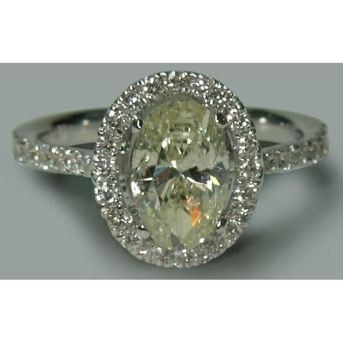 Solitaire Met Accenten 2.03 Ct. Ovale Halo-stijl verlovingsring WG 14K - harrychadent.nl