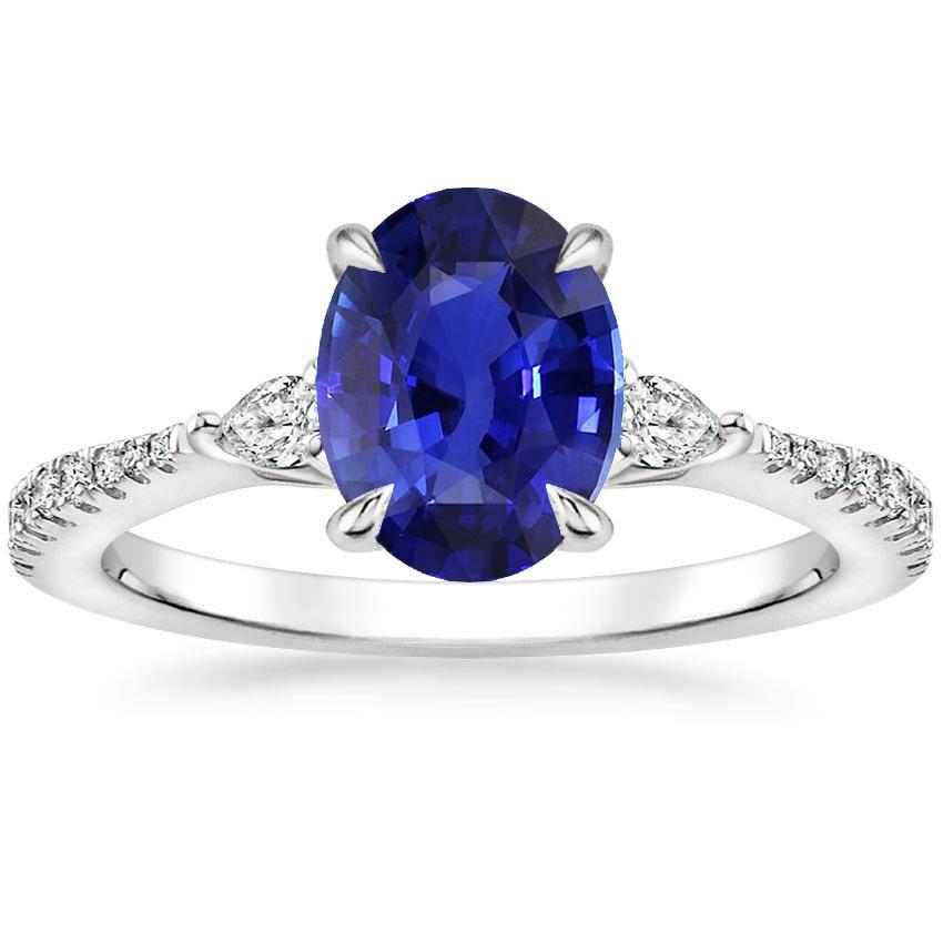 Solitaire blauwe saffier met peer en ronde diamanten accentring 3 karaat - harrychadent.nl