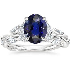 Solitaire blauwe saffier ring & diamanten accenten 5,50 karaat bladstijl