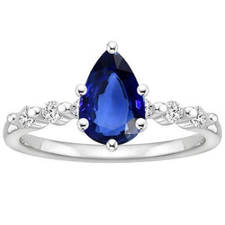 Solitaire blauwe saffier trouwring met diamanten accenten 3 karaat