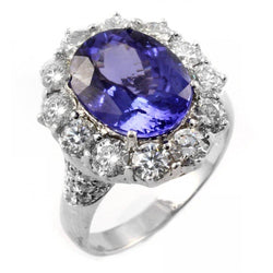 Solitaire met accent 7,25 ct. Tanzaniet en diamanten ring