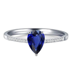 Solitaire ovale blauwe saffierring met diamanten accenten 2,50 karaat