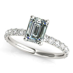 Solitaire ring met accenten ronde & smaragd diamant 5,50 karaat
