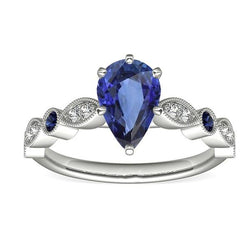 Solitaire trouwring blauwe saffier met diamanten accenten 2,50 karaat