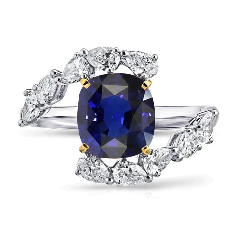 Spanning als peer diamanten kussen diepblauwe saffier ring