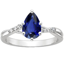 Sprankelende diamanten verlovingsring met peer blauwe saffier 4,50 karaat