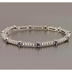 Tennisarmband blauwe saffier en diamant 8,40 karaat witgoud 14K