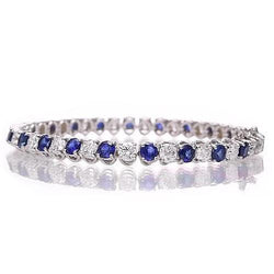 Tennisarmband met blauwe saffier en diamanten 8,40 karaat witgoud 14K