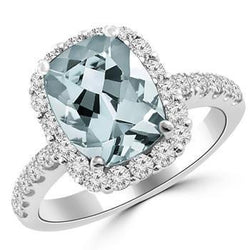 Verlovingsring 11.25 ct Aquamarijn met diamanten witgoud 14K