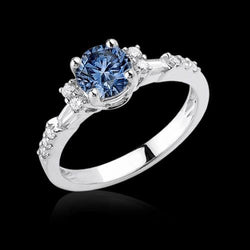 Witgouden 1 karaats verlovingsring met blauwe en witte diamanten
