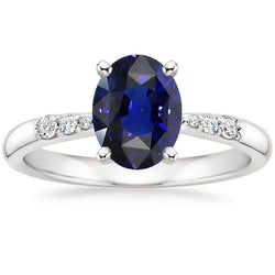 Witgouden damesring Ovale blauwe saffier en ronde diamanten 3,50 karaat