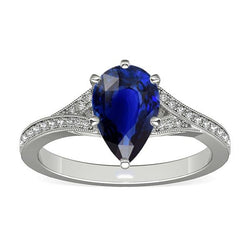 Witgouden ring met Sri Lankaanse saffier, peer en ronde diamanten 4 karaat