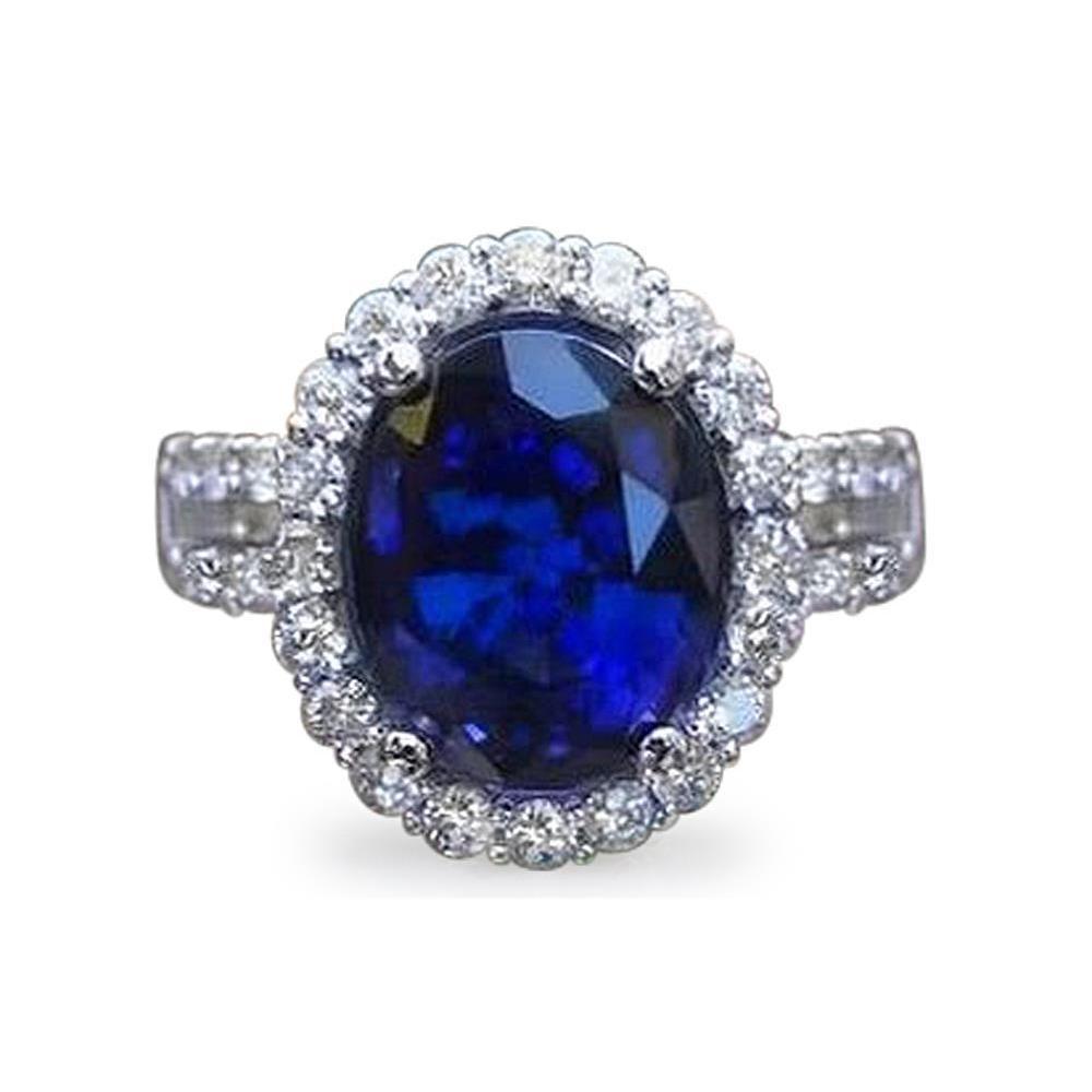 Witgouden ring met ronde diamant van 5,75 ct in Sri Lanka met blauwe saffier - harrychadent.nl