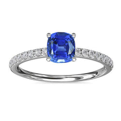 Witgouden solitaire ring met blauwe saffier en geaccentueerde diamant 2,50 karaat