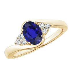 diamanten damesring geaccentueerd griffel diep ovaal blauwe saffier 3,75 karaat
